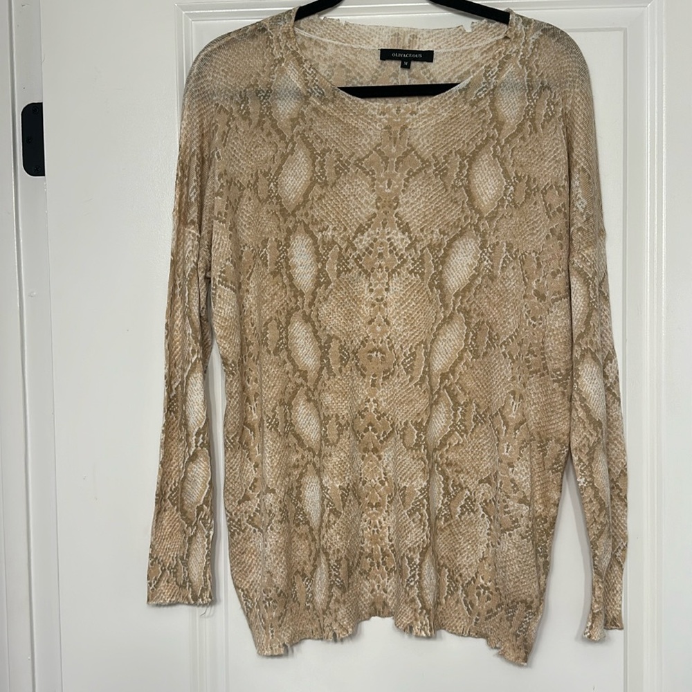 Snake print sweater with distressed hem lines